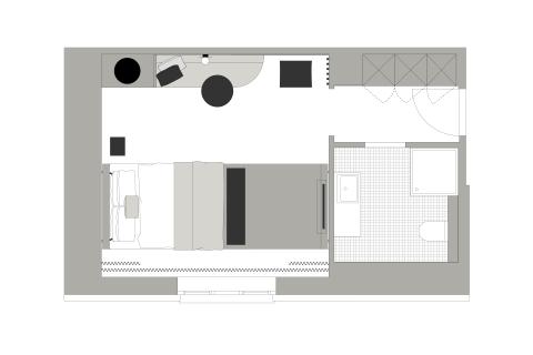 Umrissplan eines größeren Hotelzimmers