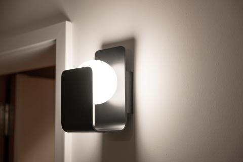 Close up of wall light with housing made of metal